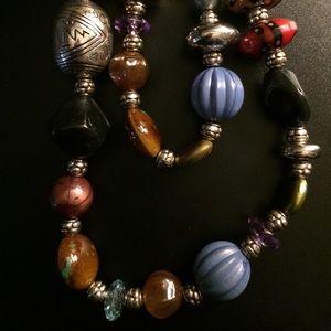 Multi faceted /beaded necklace.